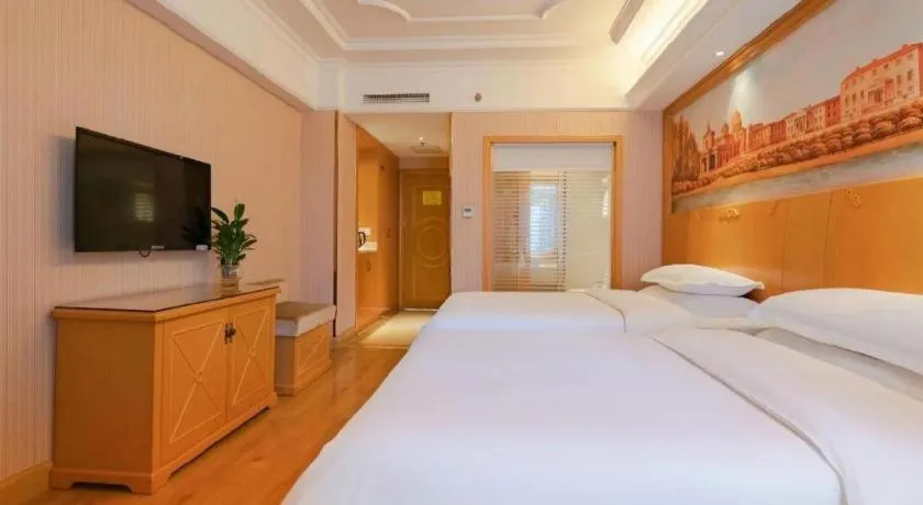 Bed in Vienna International Hotel Lhasa Potala Palace