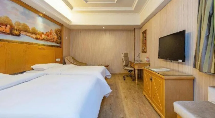 Bed in Vienna International Hotel Lhasa Potala Palace