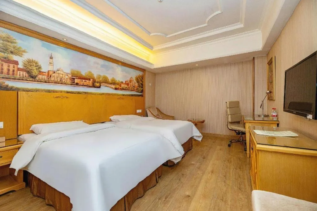 Bed in Vienna International Hotel Lhasa Potala Palace