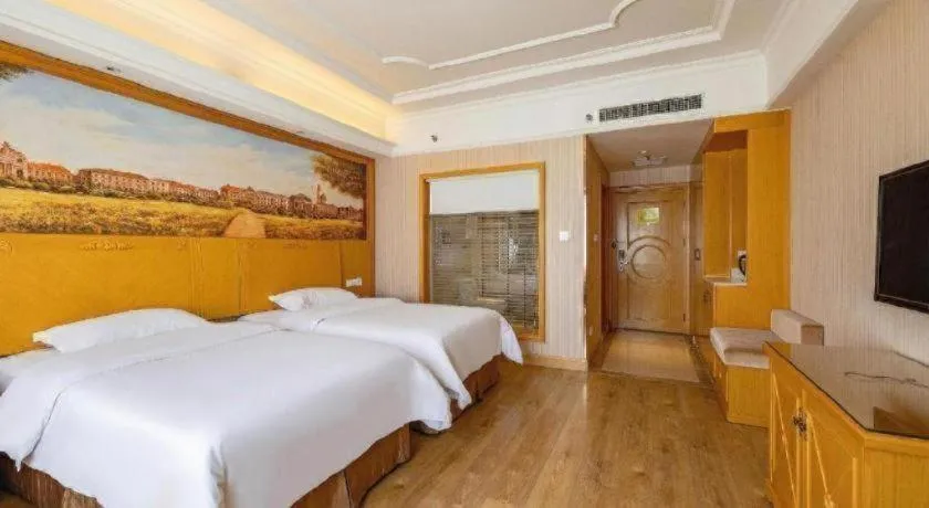 Bed in Vienna International Hotel Lhasa Potala Palace