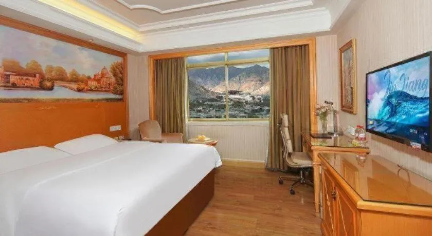 Bed in Vienna International Hotel Lhasa Potala Palace