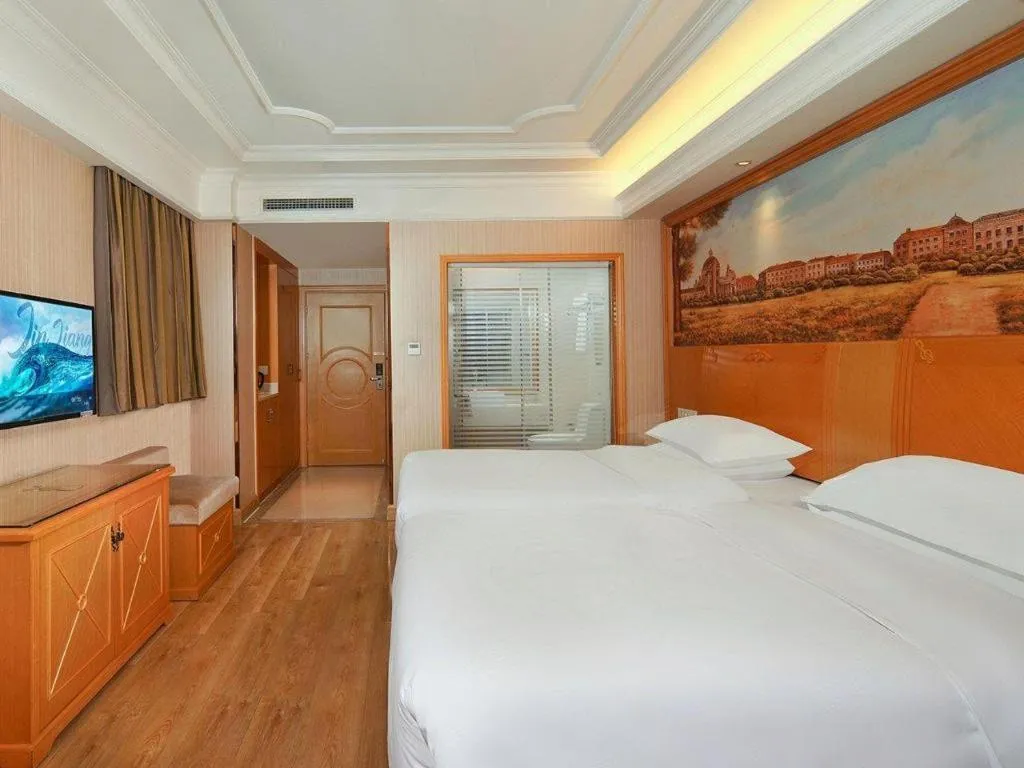 Bed in Vienna International Hotel Lhasa Potala Palace