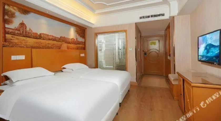 Bed in Vienna International Hotel Lhasa Potala Palace