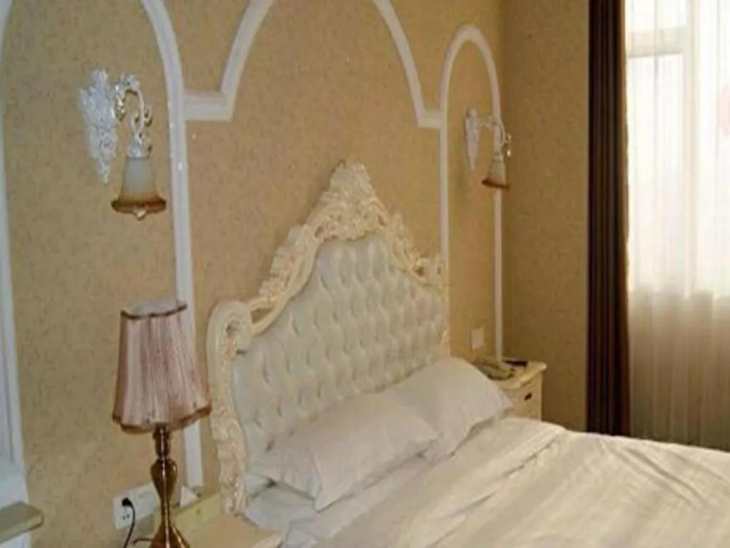 Bed in Vienna Hotel Qingdao Jiaozhou Branch