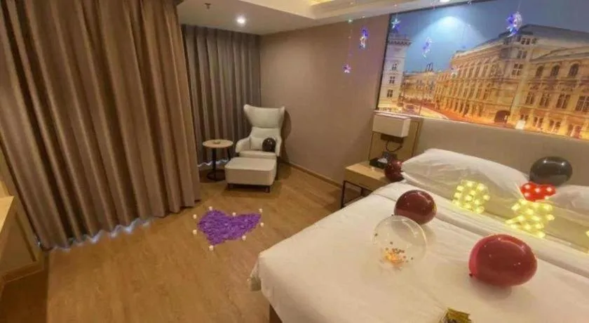 Bed in Vienna International Hotel Guangzhou Baiyun Dayuanli Plaza