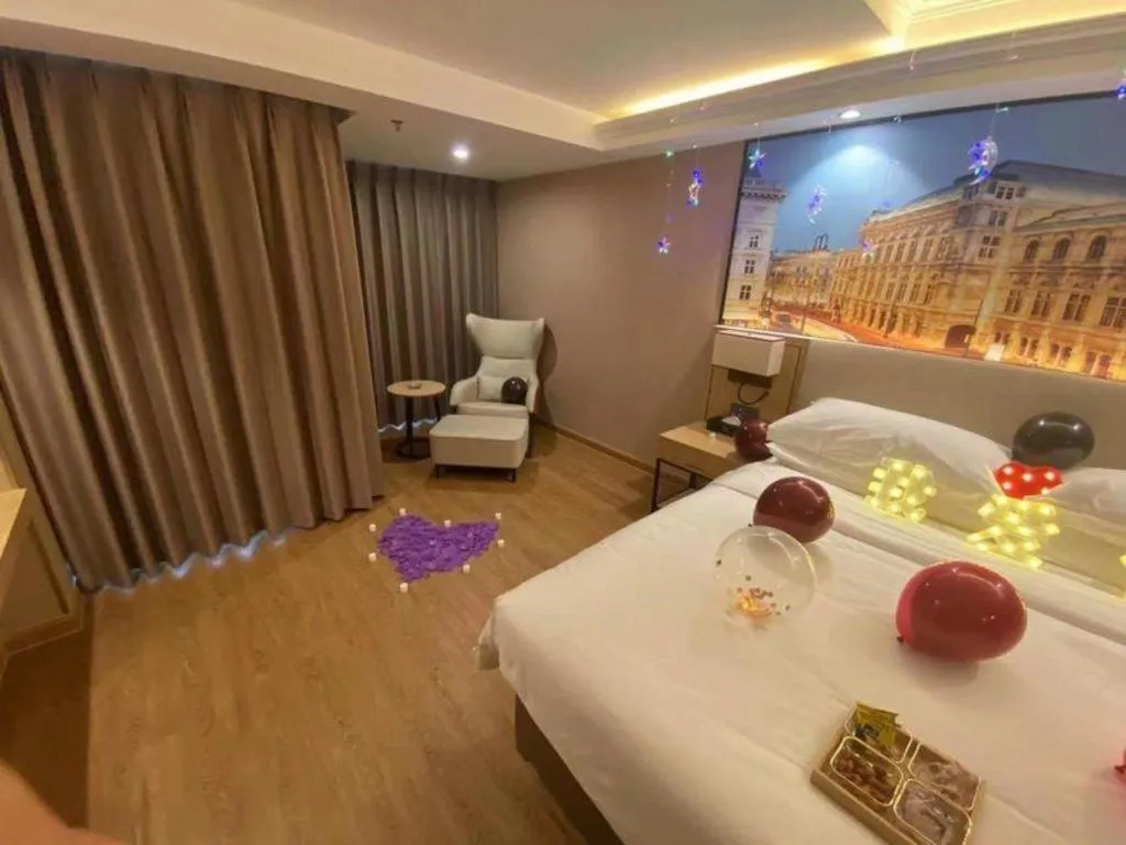 Bed in Vienna International Hotel Guangzhou Baiyun Dayuanli Plaza