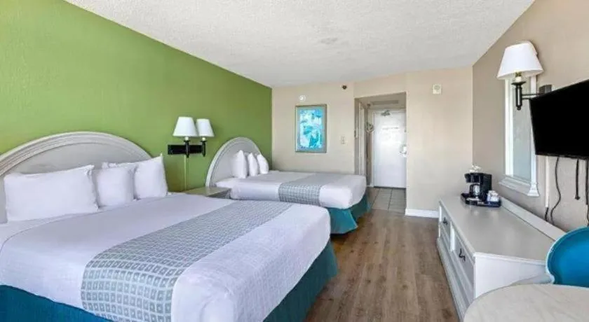 Bed in Sand Castle Resort by Patton Hospitality