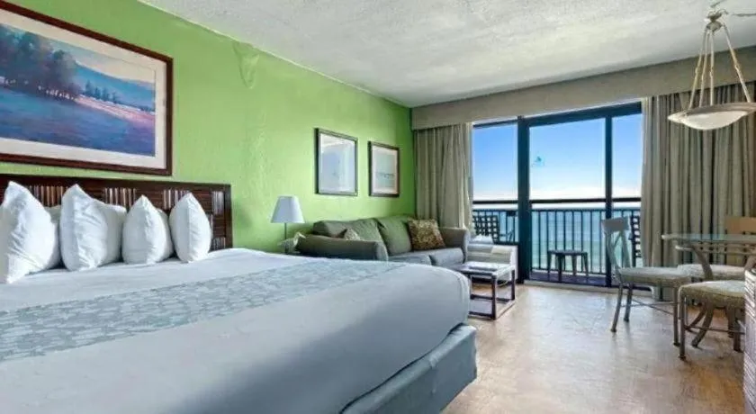 Bed in Sand Castle Resort by Patton Hospitality