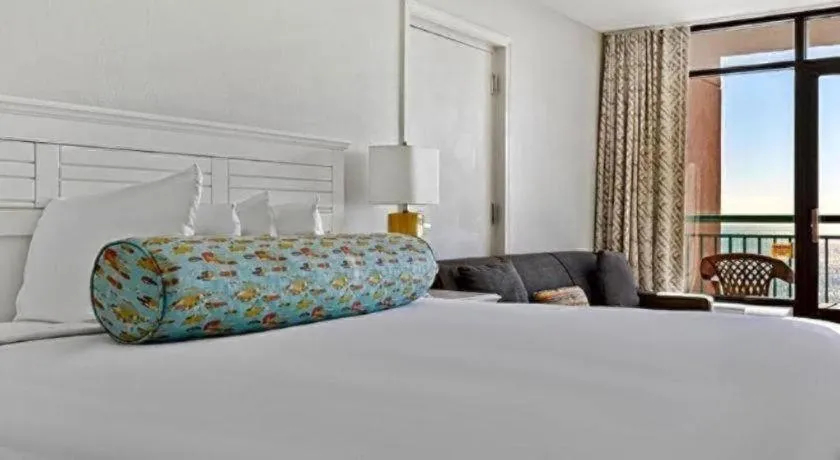 Bed in Sand Castle Resort by Patton Hospitality