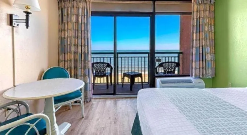 Bed in Sand Castle Resort by Patton Hospitality