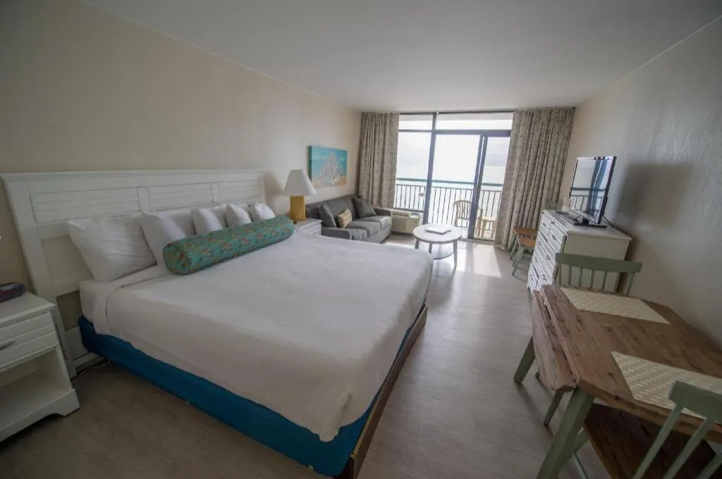 Bed in Sand Castle Resort by Patton Hospitality