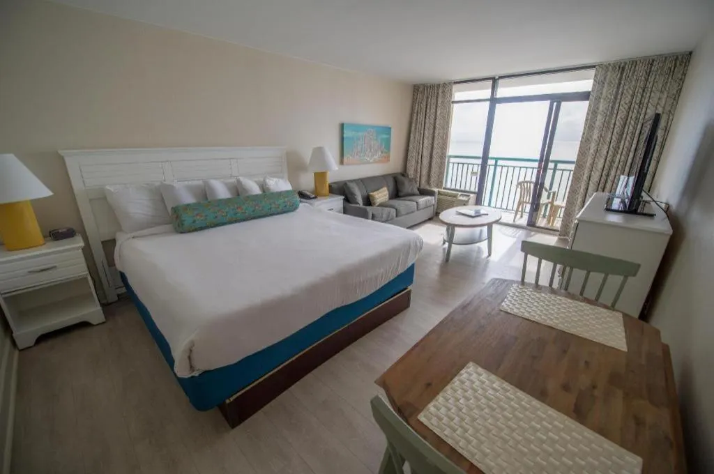 Bed in Sand Castle Resort by Patton Hospitality