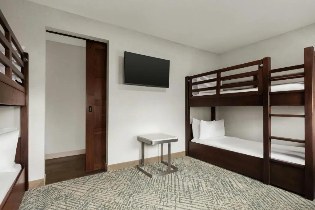 Bed in Courtyard by Marriott Anaheim Theme Park Entrance