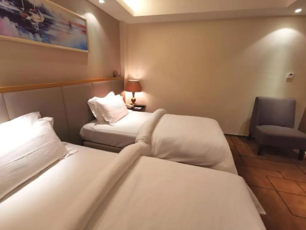 Bed in Jinjiang Metropolo Shanghai Minhang