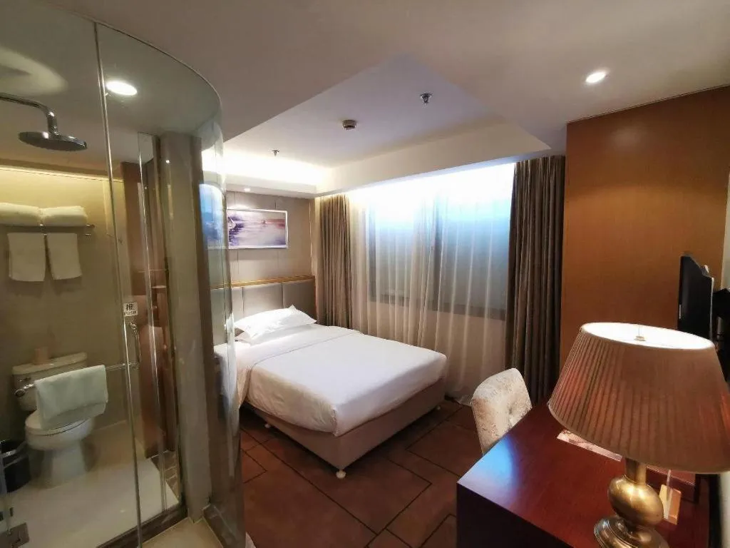 Bed in Jinjiang Metropolo Shanghai Minhang