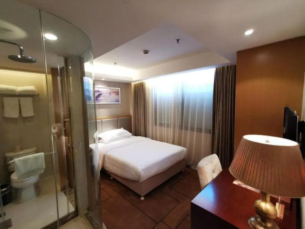 Bed in Jinjiang Metropolo Shanghai Minhang