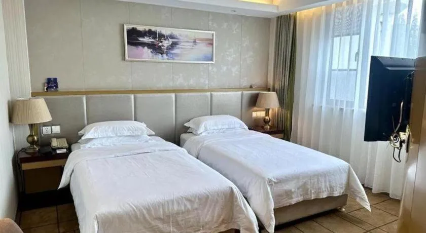 Bed in Jinjiang Metropolo Shanghai Minhang