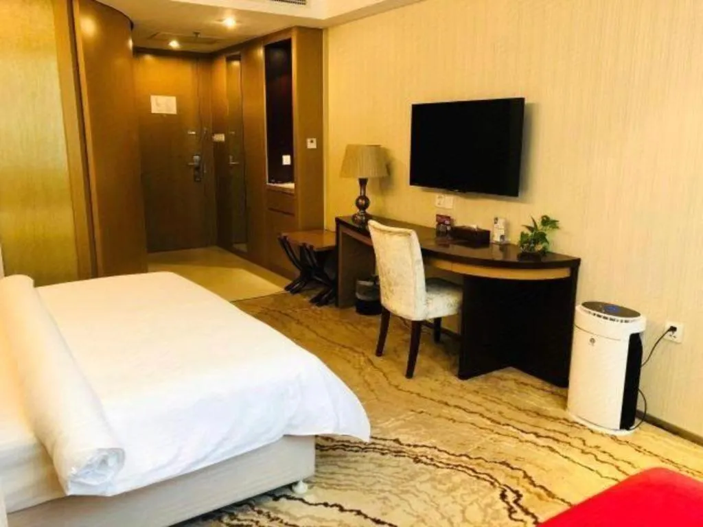 Bed in Jinjiang Metropolo Shanghai Minhang