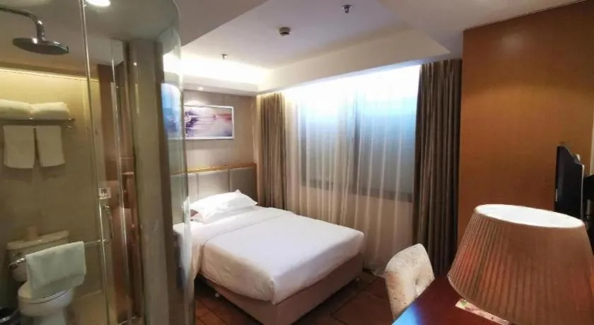 Bed in Jinjiang Metropolo Shanghai Minhang