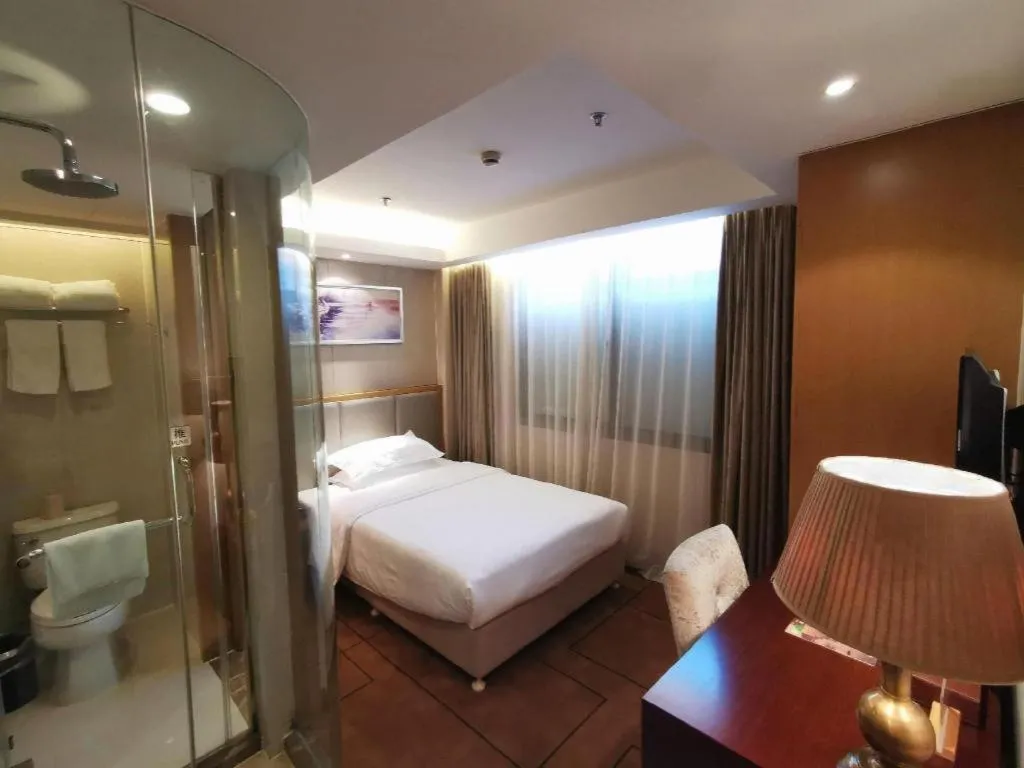 Bed in Jinjiang Metropolo Shanghai Minhang