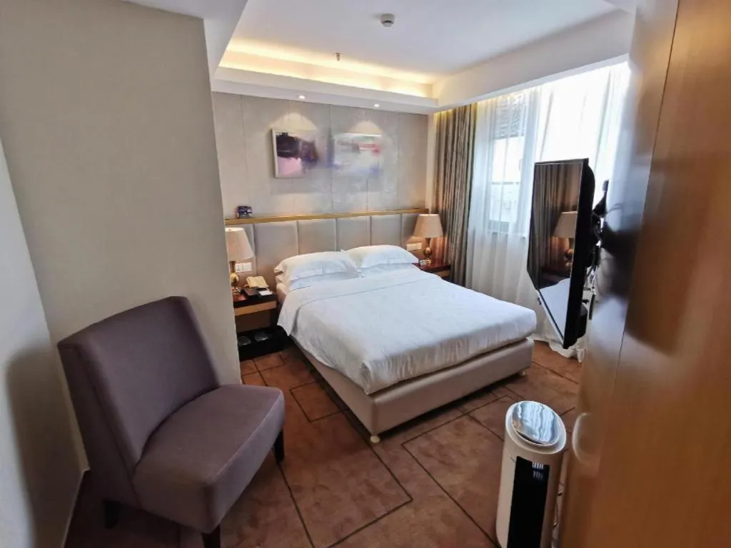 Bed in Jinjiang Metropolo Shanghai Minhang