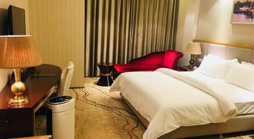 Bed in Jinjiang Metropolo Shanghai Minhang