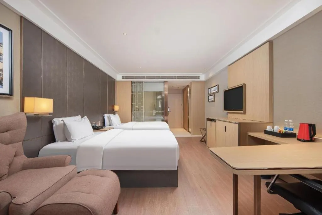 Bed in Echeng Hotel Wuhan Optics Valley Square Yangjiawan Metro Station