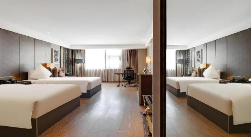 Bed in Echeng Hotel Wuhan Optics Valley Square Yangjiawan Metro Station