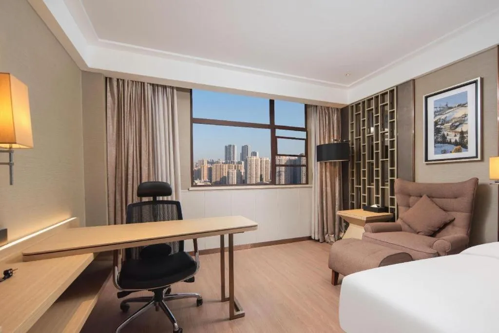 Bed in Echeng Hotel Wuhan Optics Valley Square Yangjiawan Metro Station