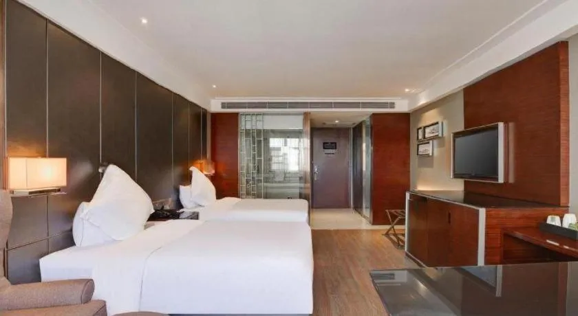 Bed in Echeng Hotel Wuhan Optics Valley Square Yangjiawan Metro Station