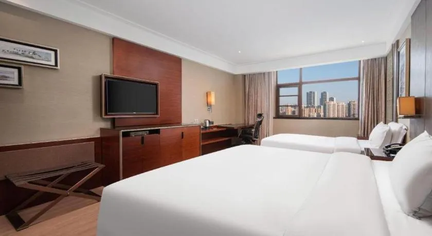 Bed in Echeng Hotel Wuhan Optics Valley Square Yangjiawan Metro Station