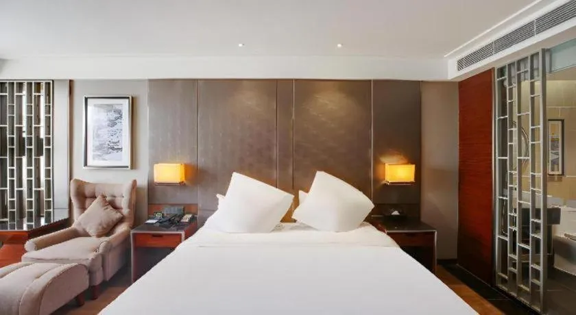 Bed in Echeng Hotel Wuhan Optics Valley Square Yangjiawan Metro Station