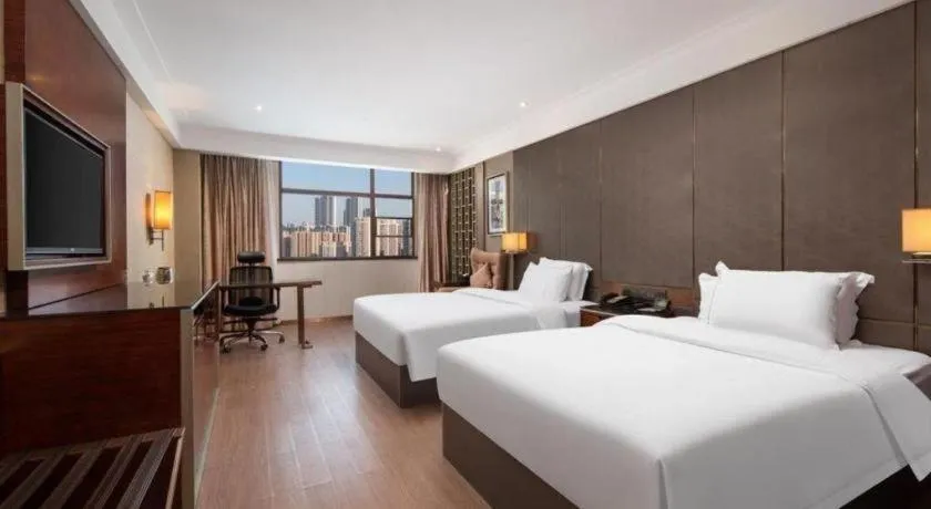 Bed in Echeng Hotel Wuhan Optics Valley Square Yangjiawan Metro Station