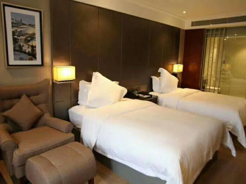 Bed in Echeng Hotel Wuhan Optics Valley Square Yangjiawan Metro Station