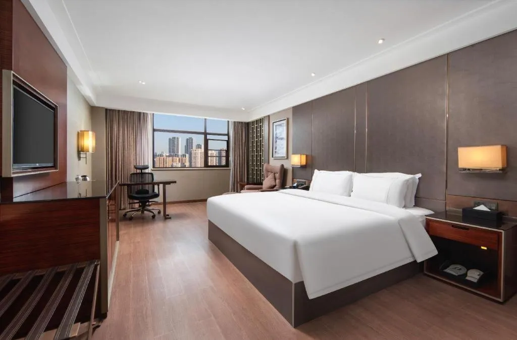 Bed in Echeng Hotel Wuhan Optics Valley Square Yangjiawan Metro Station