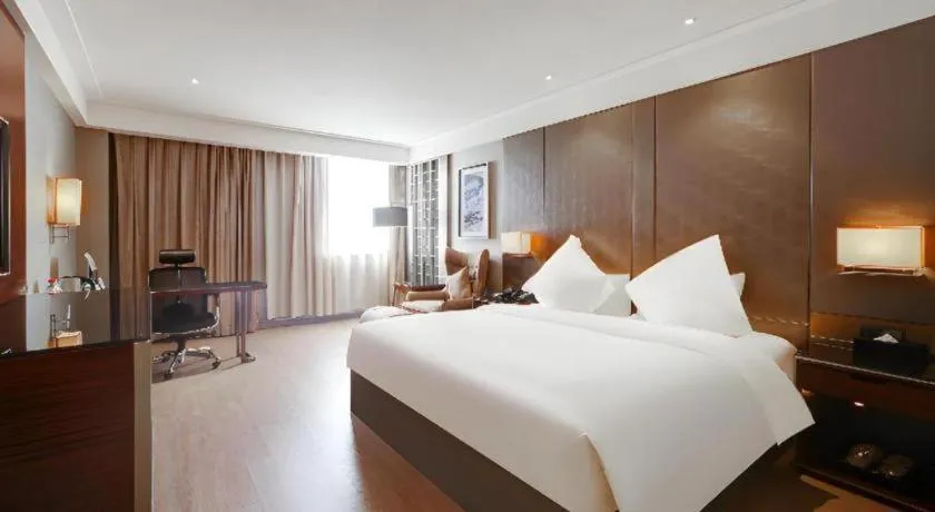 Bed in Echeng Hotel Wuhan Optics Valley Square Yangjiawan Metro Station