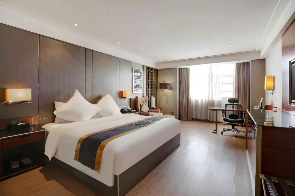 Bed in Echeng Hotel Wuhan Optics Valley Square Yangjiawan Metro Station