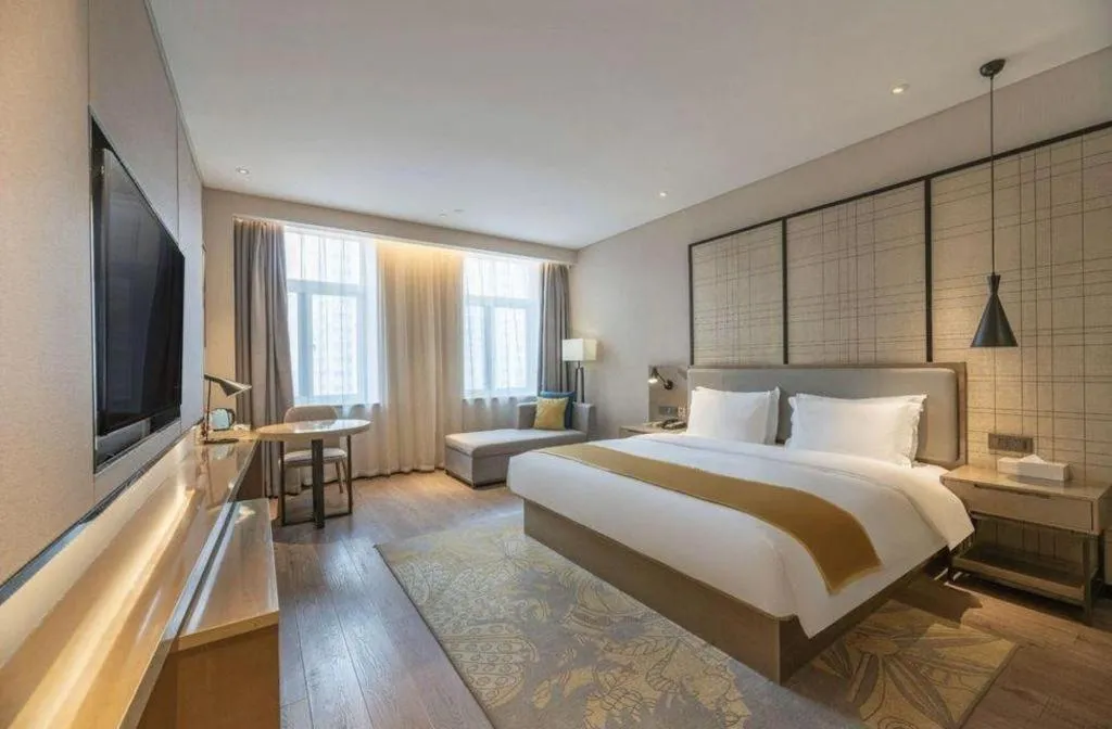 Bed in Echarm Hotel Jinan Railway Station Daming Lake