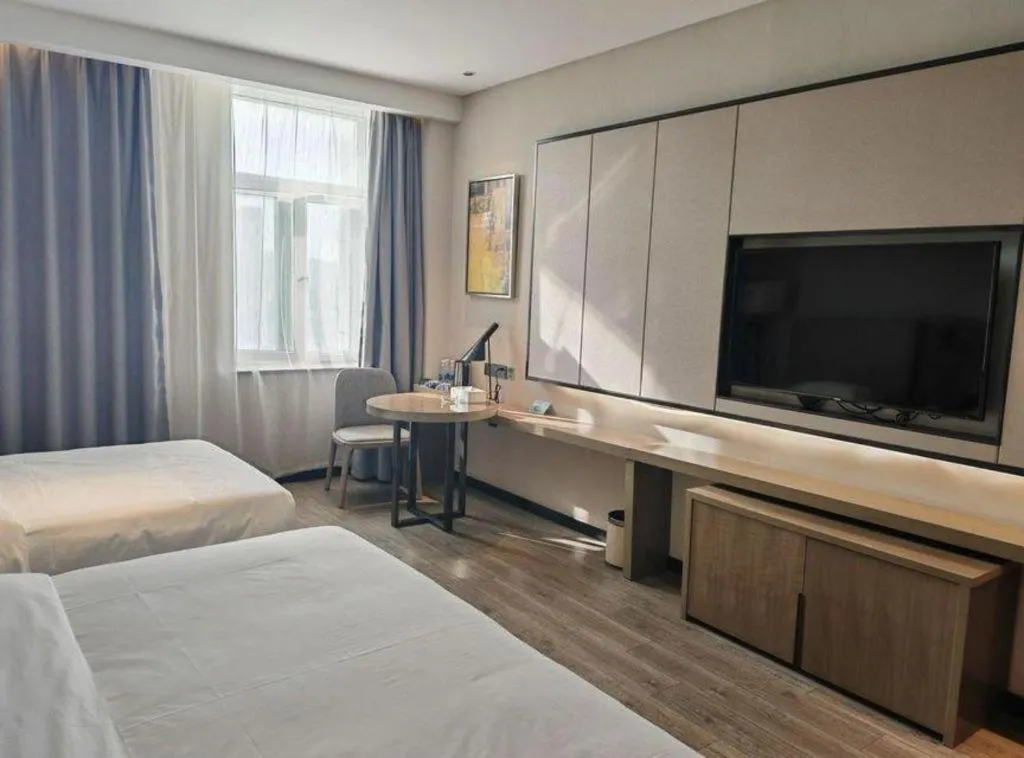 Bed in Echarm Hotel Jinan Railway Station Daming Lake