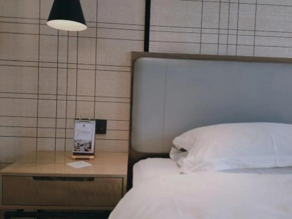 Bed in Echarm Hotel Jinan Railway Station Daming Lake