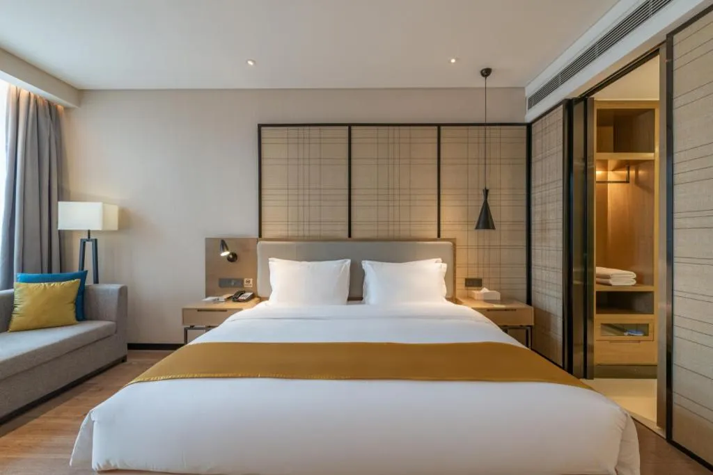 Bed in Echarm Hotel Jinan Railway Station Daming Lake