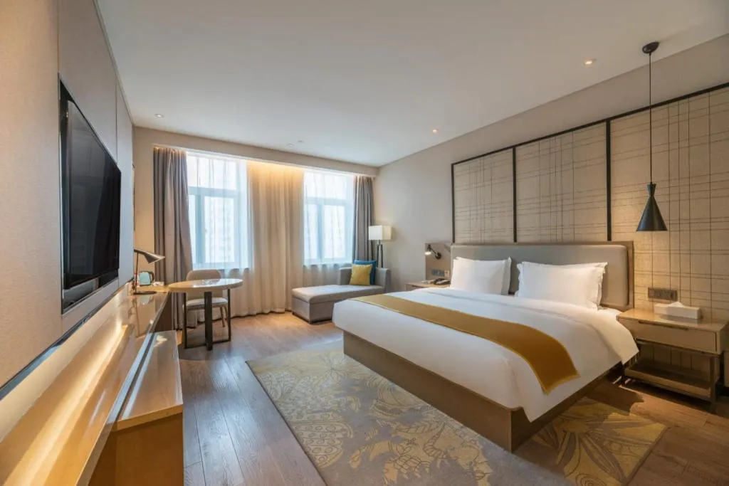 Bed in Echarm Hotel Jinan Railway Station Daming Lake