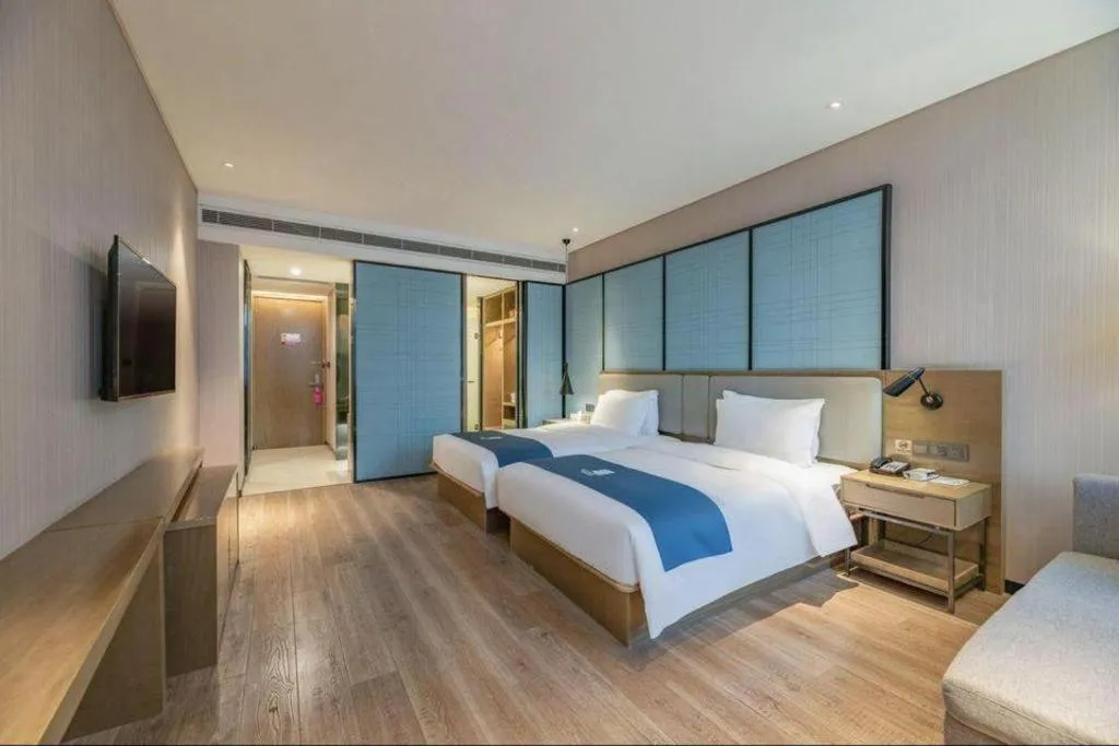 Bed in Echarm Hotel Jinan Railway Station Daming Lake