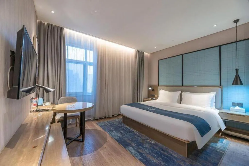 Bed in Echarm Hotel Jinan Railway Station Daming Lake