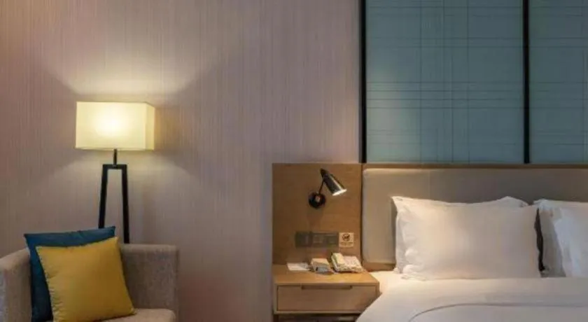 Bed in Echarm Hotel Jinan Railway Station Daming Lake