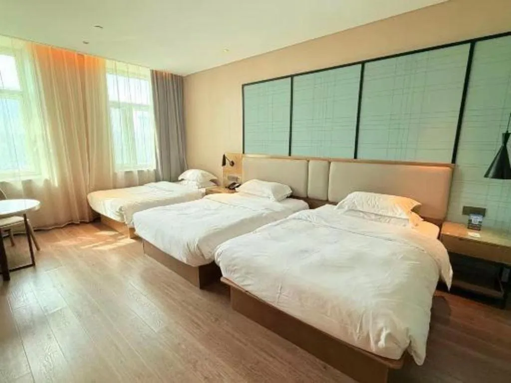 Bed in Echarm Hotel Jinan Railway Station Daming Lake