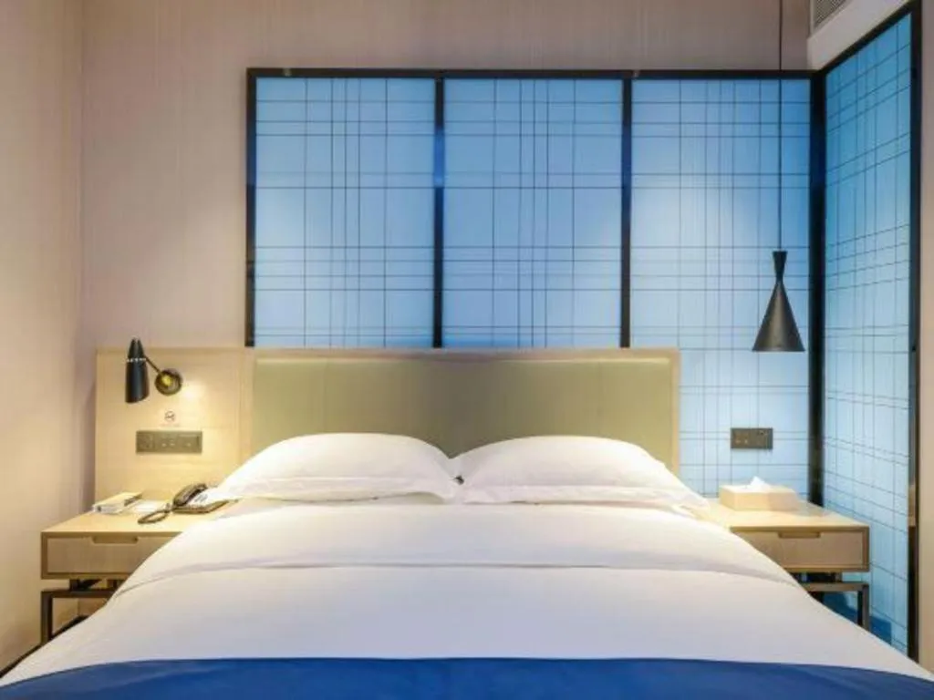 Bed in Echarm Hotel Jinan Railway Station Daming Lake