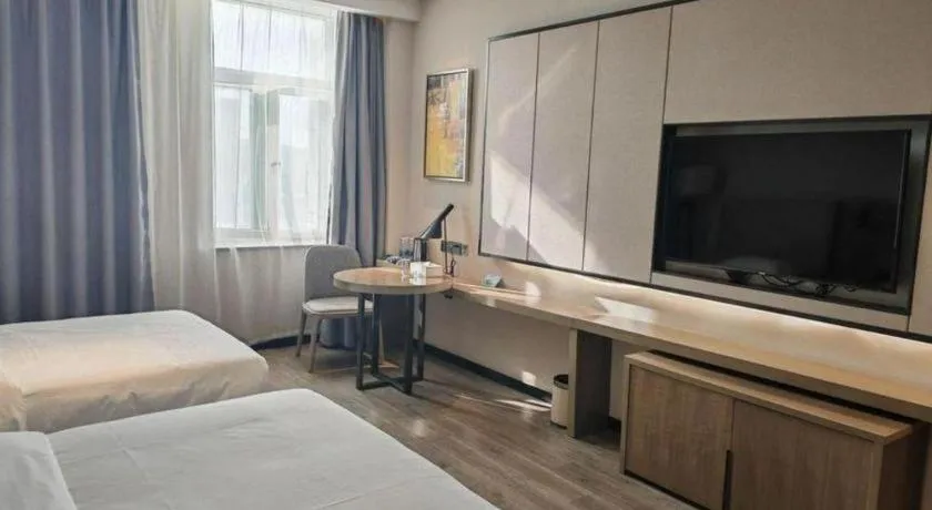 Bed in Echarm Hotel Jinan Railway Station Daming Lake