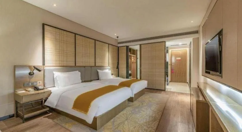 Bed in Echarm Hotel Jinan Railway Station Daming Lake