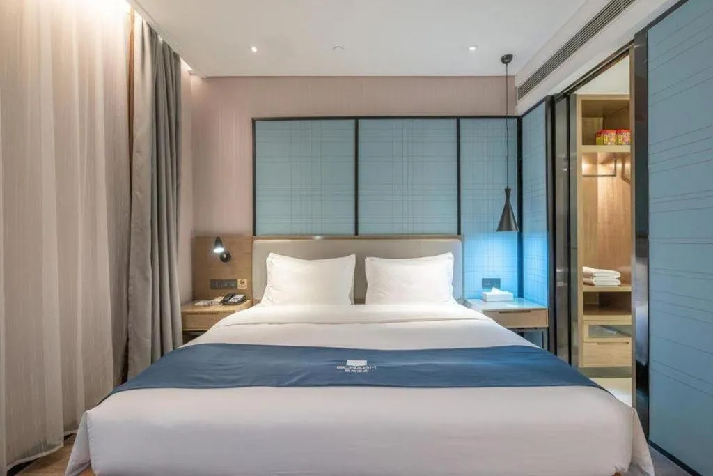 Bed in Echarm Hotel Jinan Railway Station Daming Lake